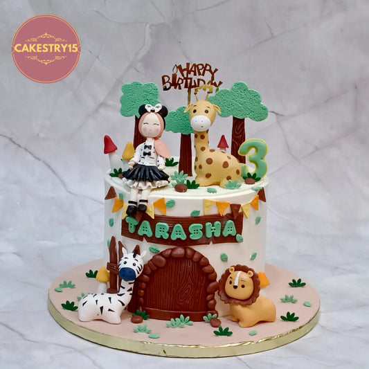 Jungle theme 3rd birthday cake in pineapple flavour with animal figurines, eggless kids birthday cake by Cakestry15 Noida