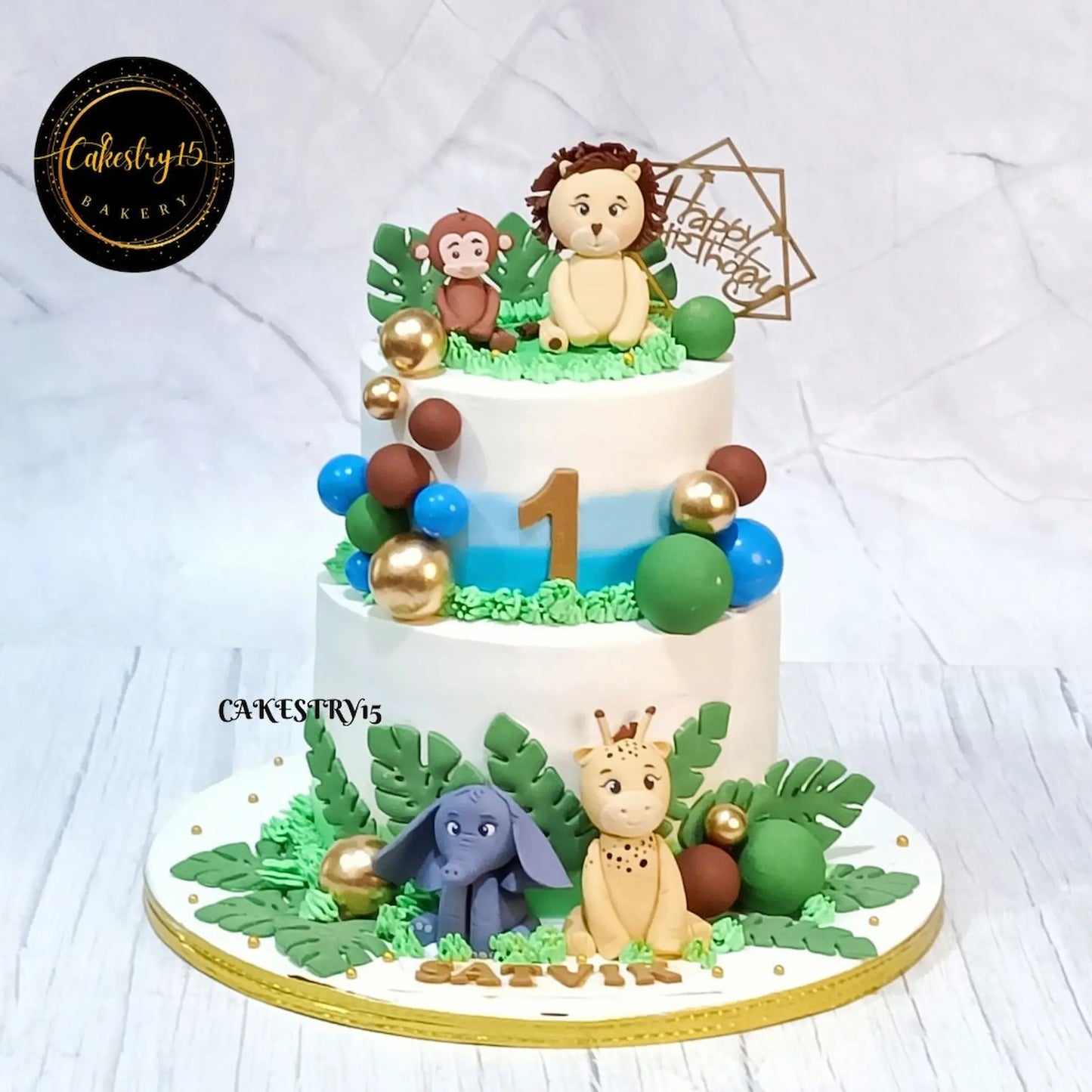 Eggless jungle theme kids birthday cake with animal toppers and pineapple flavour for theme cake Noida celebrations.