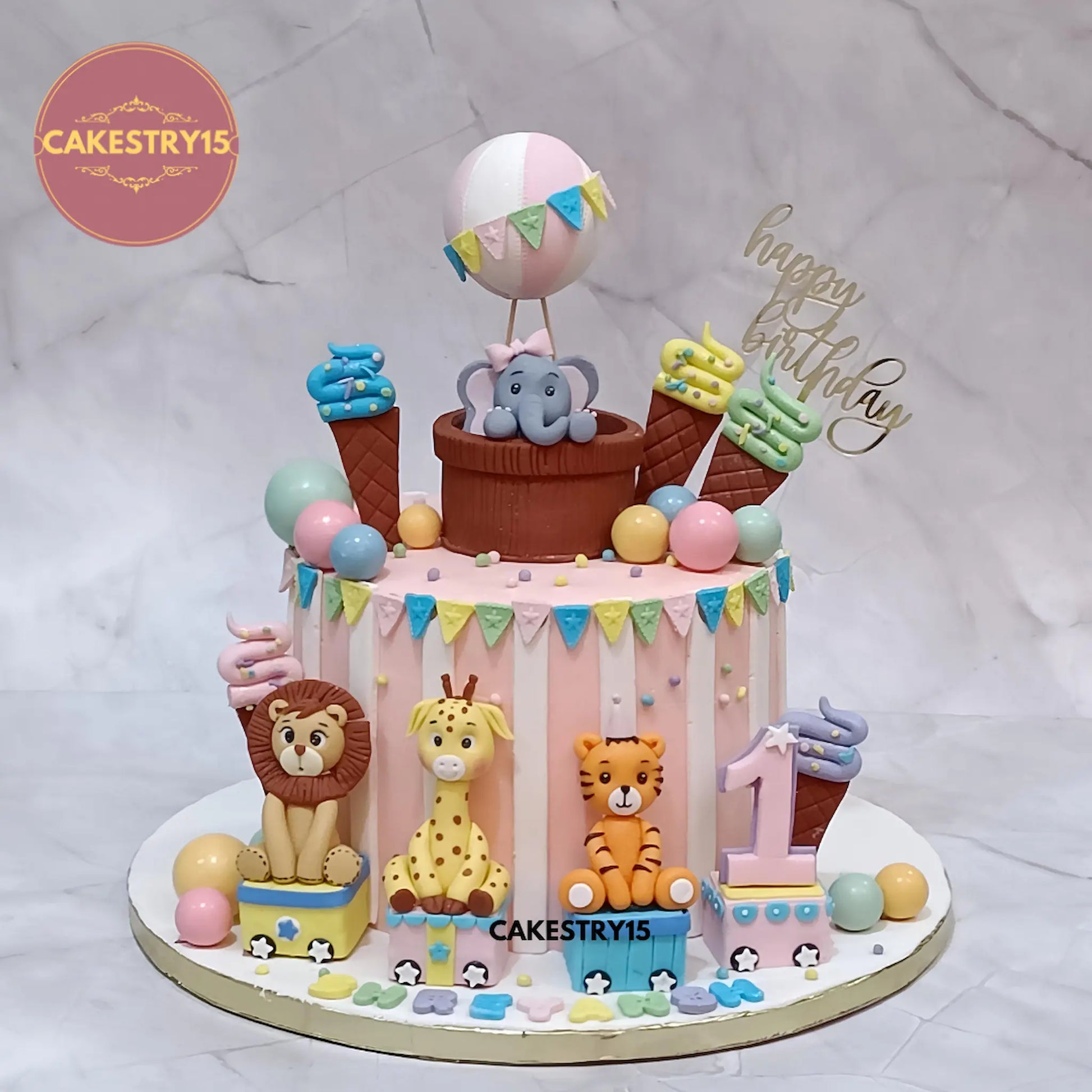 Jungle theme first birthday cake with elephant balloon and jungle train, eggless choco vanilla cake by Cakestry15 in Noida