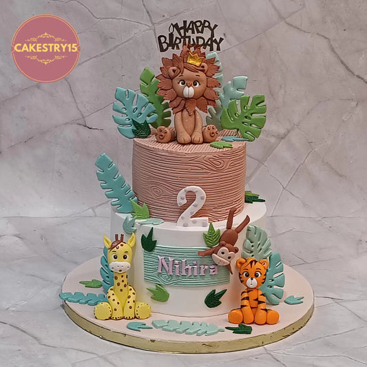 Jungle theme kids 2nd birthday cake with animals for Nihira in chocolate flavour eggless custom cake Noida