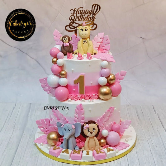 Pink jungle theme kids birthday cake with fondant safari animals, premium eggless cakes and theme cake Noida for first birthday celebrations