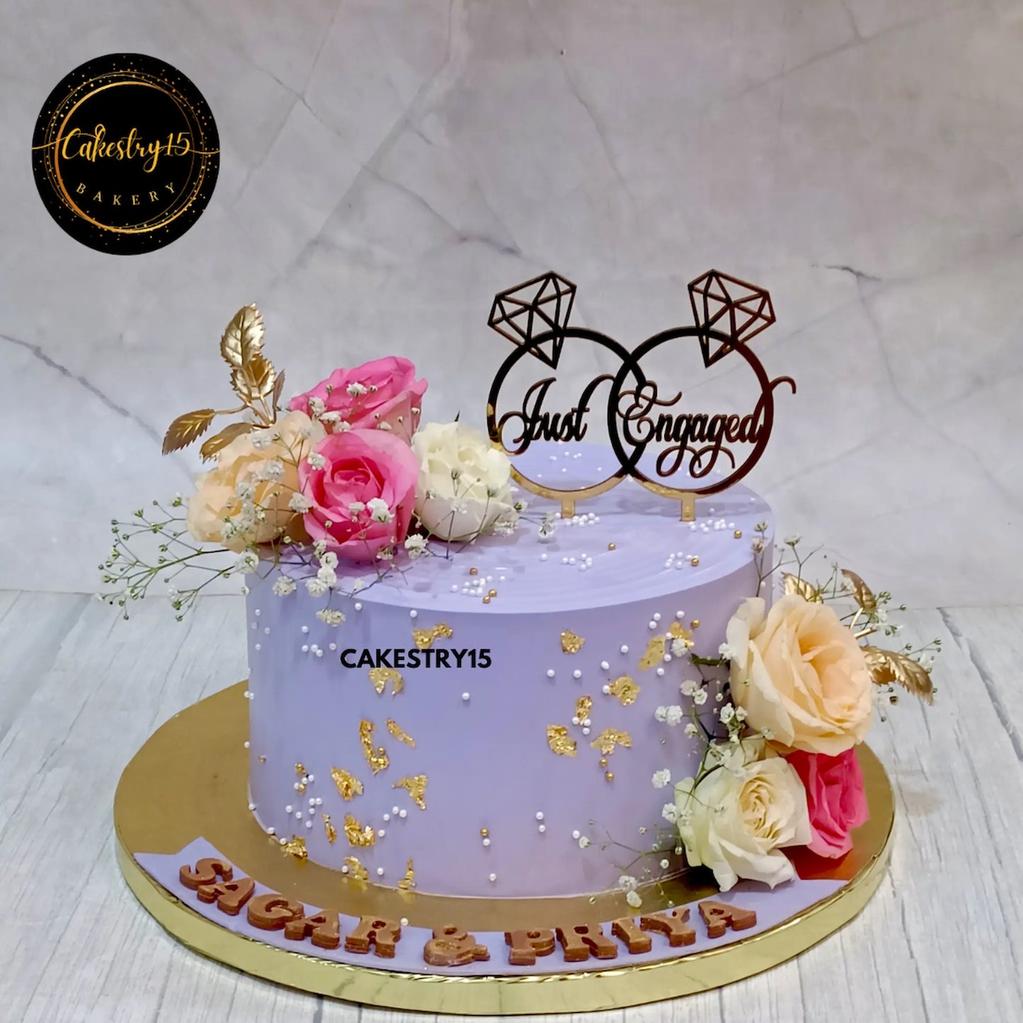 Just Engaged 2kg choco chips cake with lavender icing, roses, and tag by Cakestry15