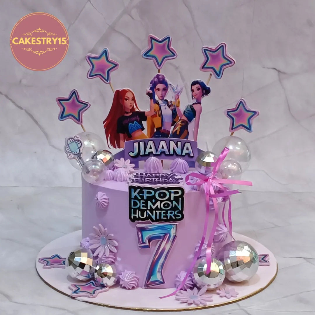 K Pop Demon Hunters kids birthday cake with lavender icing and edible toppers, premium eggless cakes and theme cake Noida design.