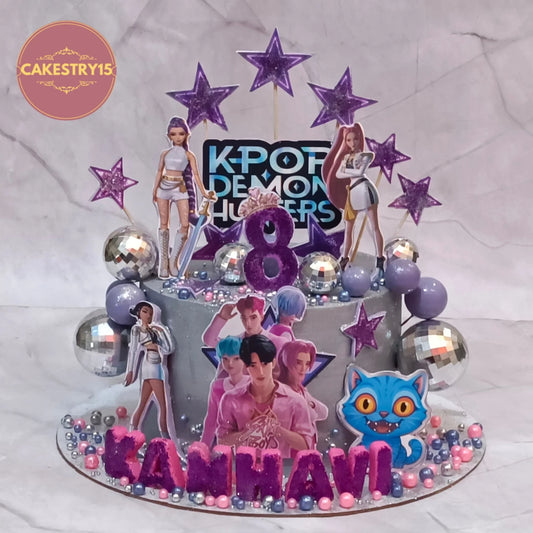 Premium K-Pop music kids birthday cake with edible K-Pop girl images, silver finish and faux disco balls, handcrafted as a theme cake Noida using fresh eggless cakes.