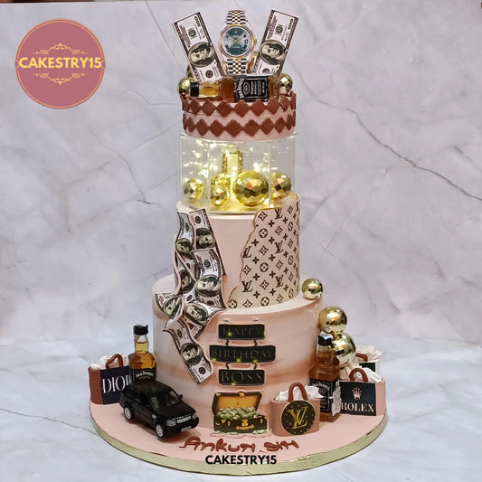 5kg luxury boss chocolate birthday cake with Louis Vuitton, dollar bills, Jack Daniel’s bottles, and rotating LED display from Cakestry15 Noida