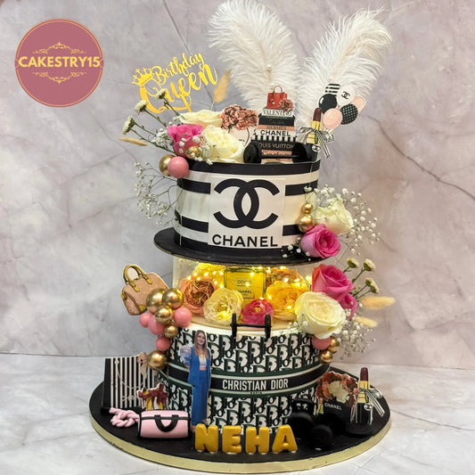 Luxury fashion brand truffle cake with Dior edible prints, spacer design, roses and makeup elements – eggless birthday cake in Noida