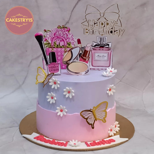 Eggless make up theme cake Noida featuring pink icing, makeup and shopping bag edible images, perfect as a stylish birthday cake.