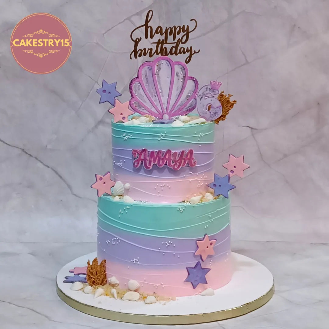 Premium kids birthday cake featuring a pastel mermaid ocean design, handcrafted as a theme cake Noida using delicious eggless cakes.