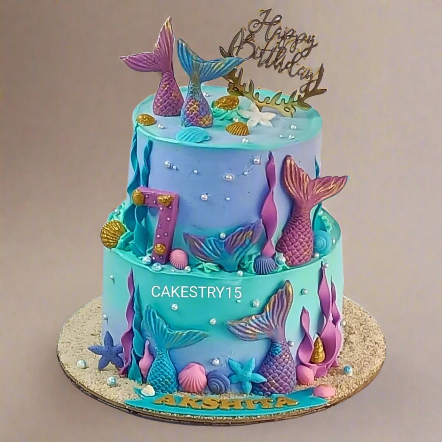 Mermaid kids birthday cake with fondant details from an eggless cakes bakery offering a theme cake Noida.