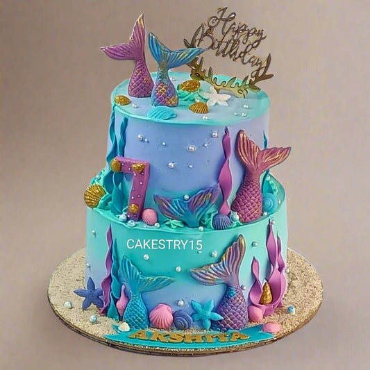 Mermaid kids birthday cake with fondant details from an eggless cakes bakery offering a theme cake Noida.