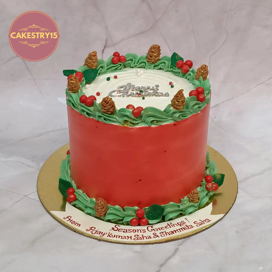 Merry Christmas theme eggless chocolate cake with red and green icing, festive fondant decorations, custom cake for festive gifting in Noida