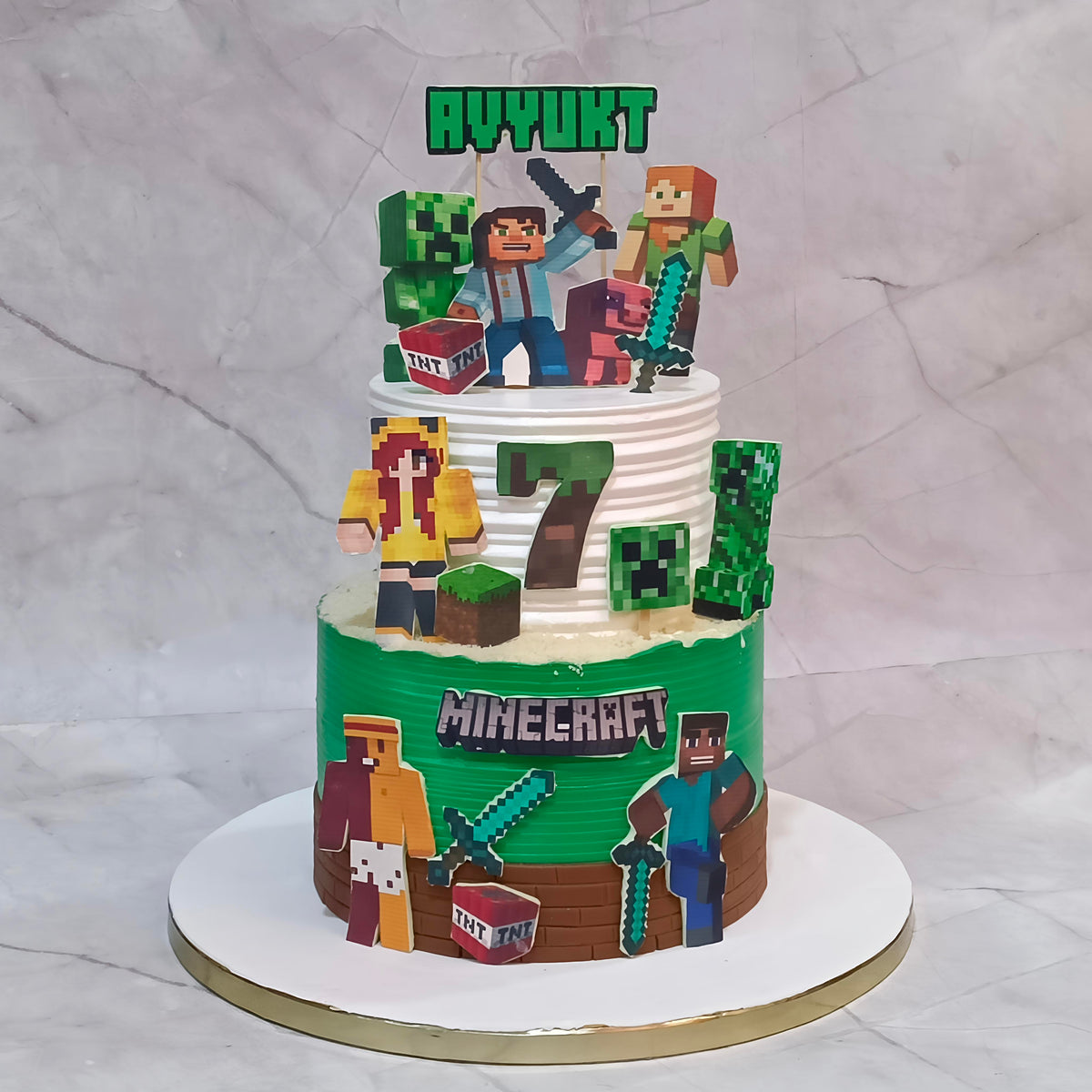Minecraft Steve 7th birthday cake for a boy, topped with Minecraft characters and elements.