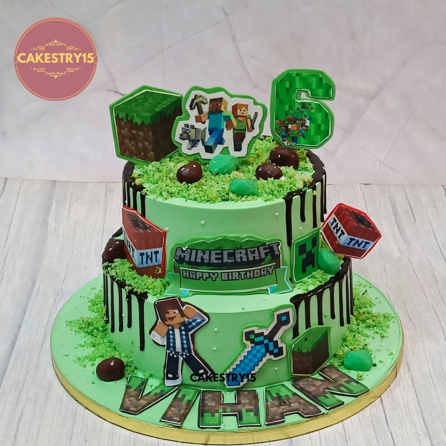 Minecraft theme eggless kids birthday cake with edible images, chocolate drips, and pineapple flavour by Cakestry15 in Noida.