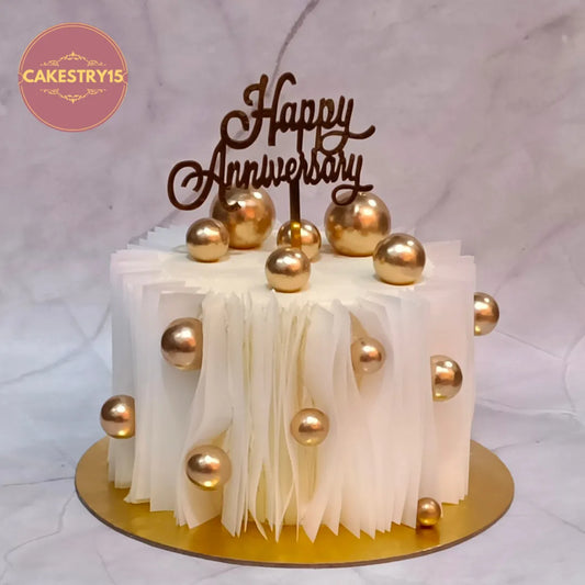 Modern Anniversary Cake handcrafted with white ganache and rice paper texture, premium eggless cake in Noida for elegant celebrations.