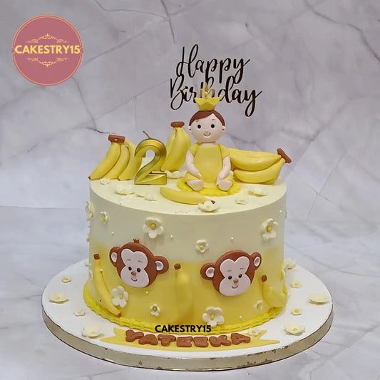 2kg chocolate monkey theme cake with baby figurine, bananas, and 2D monkey faces by Cakestry15 Noida