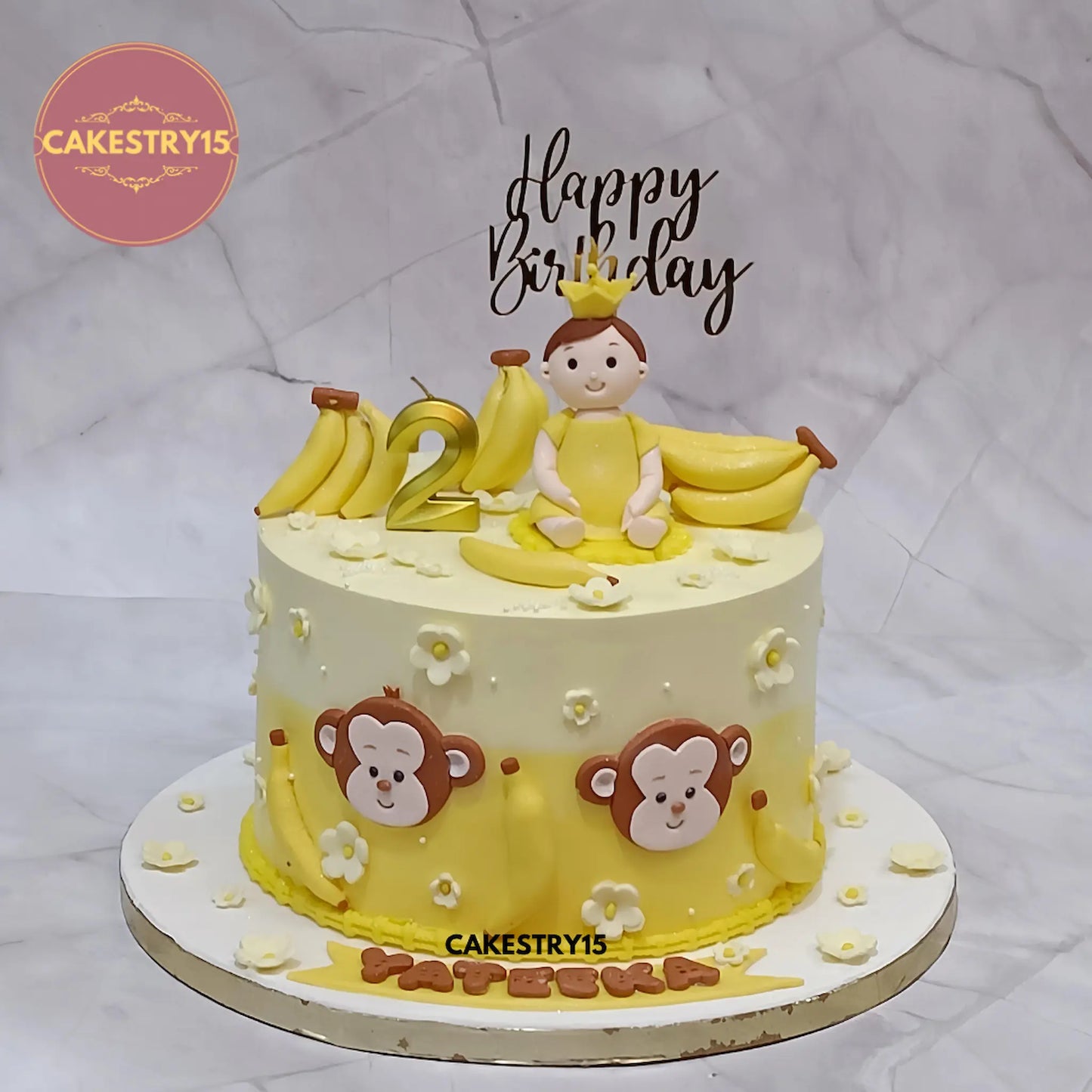 Eggless monkey theme kids birthday cake with baby figurine and fondant bananas by Cakestry15 Noida