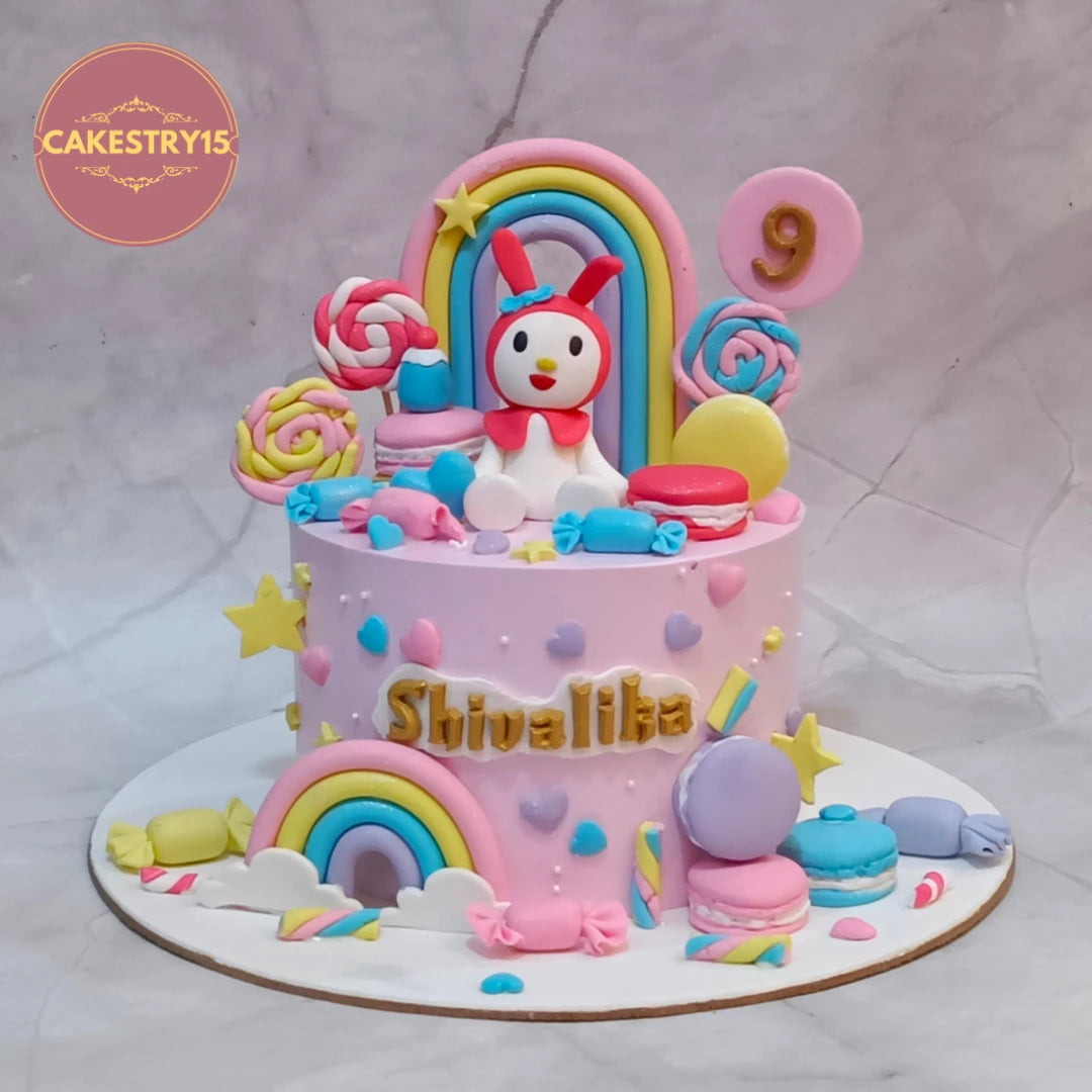 My Melody kids birthday cake with rainbows and sweet treats, handcrafted as a premium theme cake Noida using fresh eggless cakes.