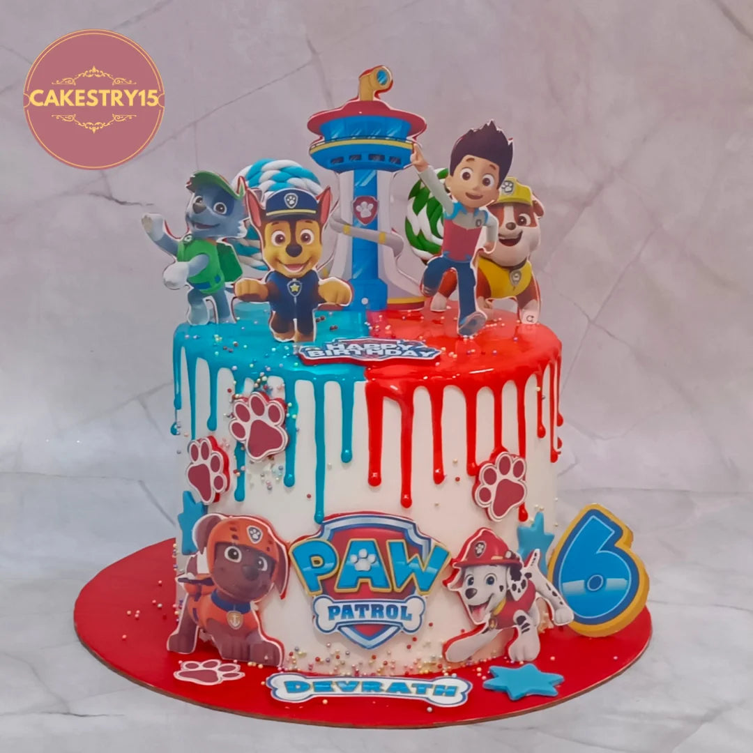 Paw Patrol kids birthday cake with edible characters and logo, a theme cake Noida option from a bakery offering eggless cakes.