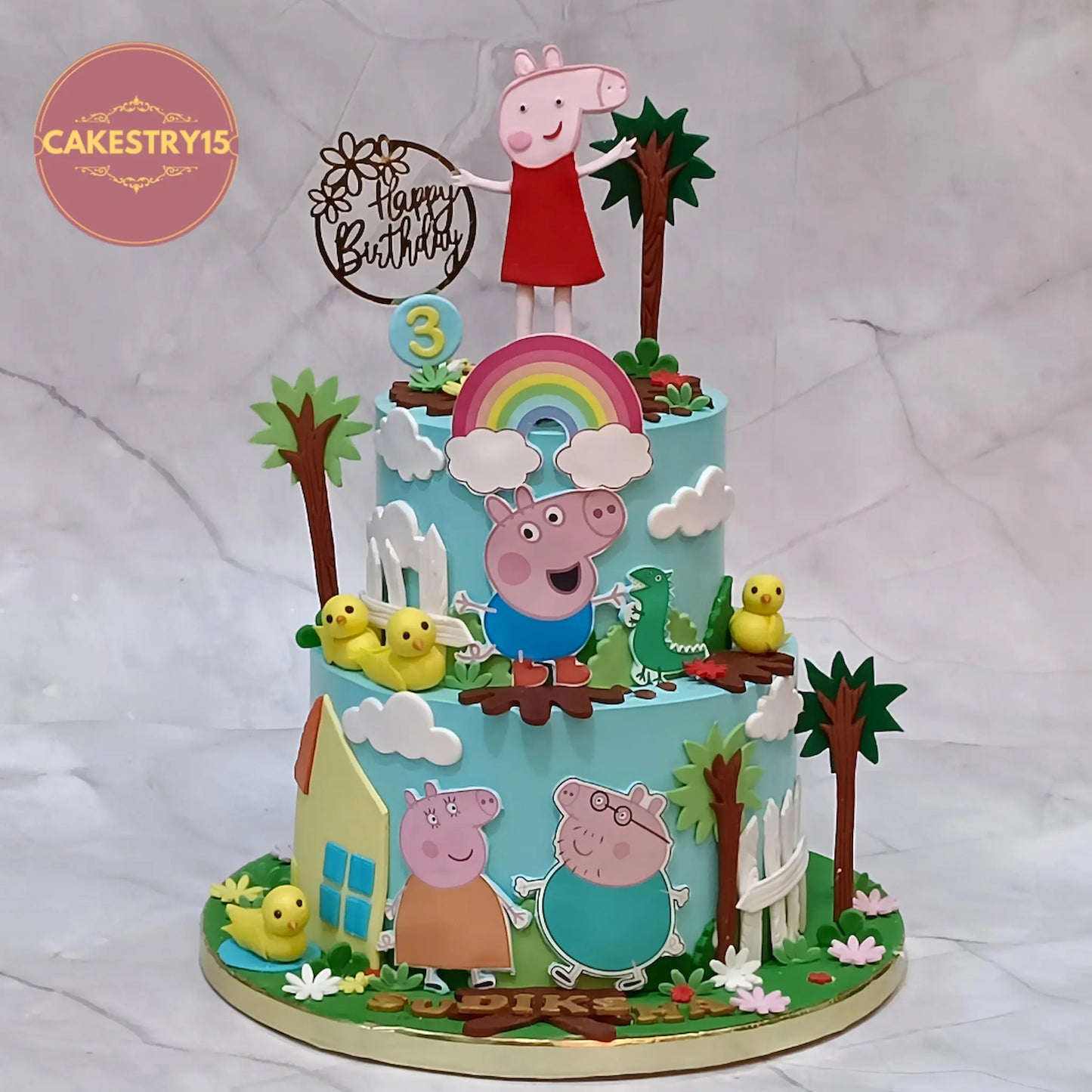 Peppa Pig theme 3rd birthday cake in choco vanilla with fondant rainbow, house, ducks and characters eggless cake Noida