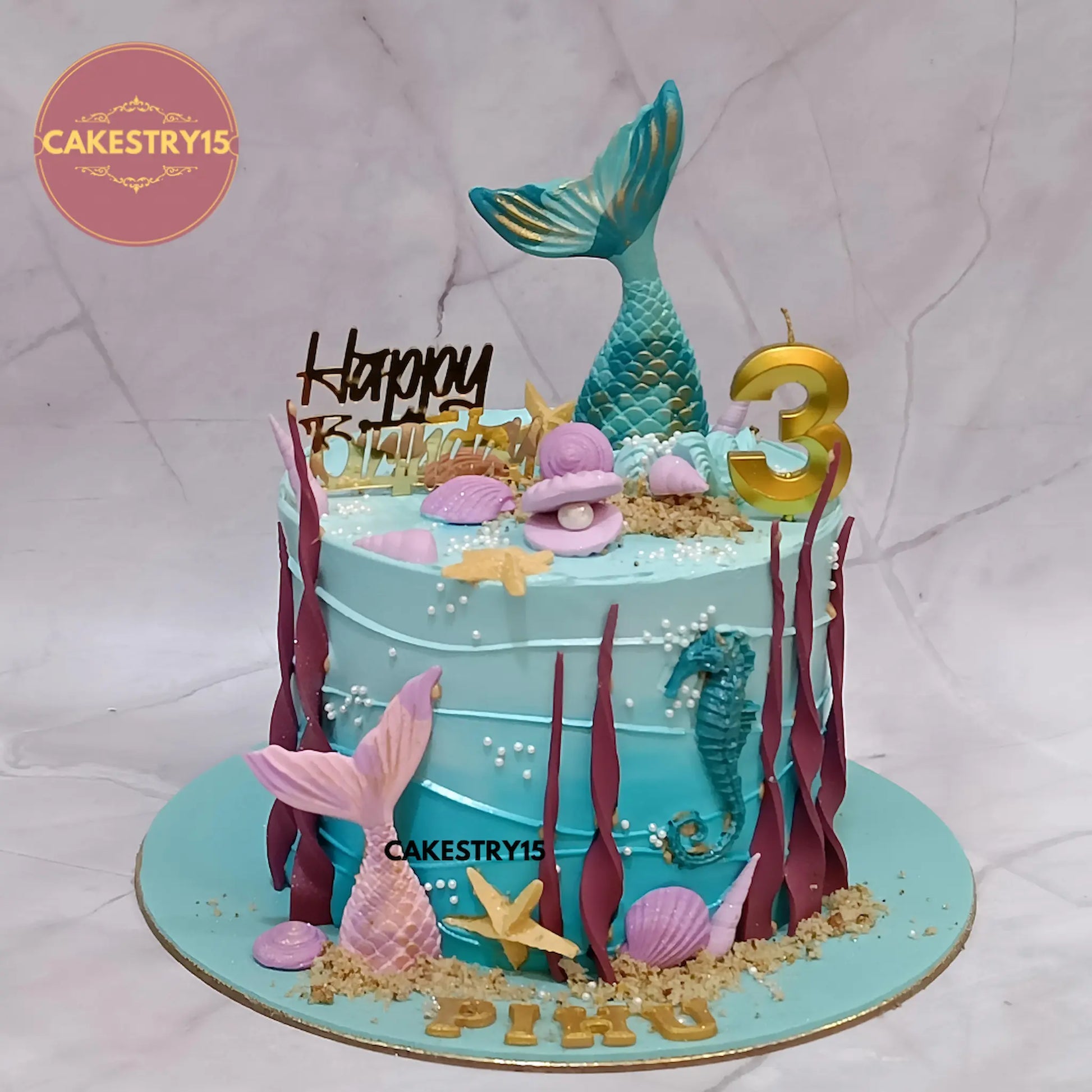 1kg choco vanilla mermaid theme birthday cake with fondant fishtails, seahorses, and seashells by Cakestry15 Noida