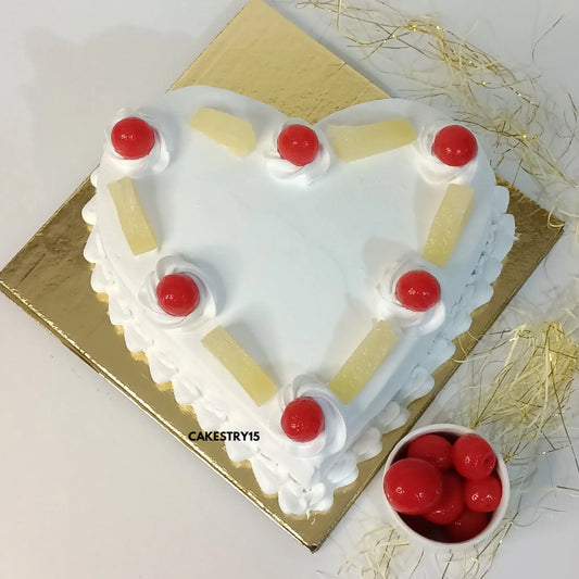 Pineapple Heart CakeHeart-shaped 1kg pineapple cake topped with cherries and pineapple chunks