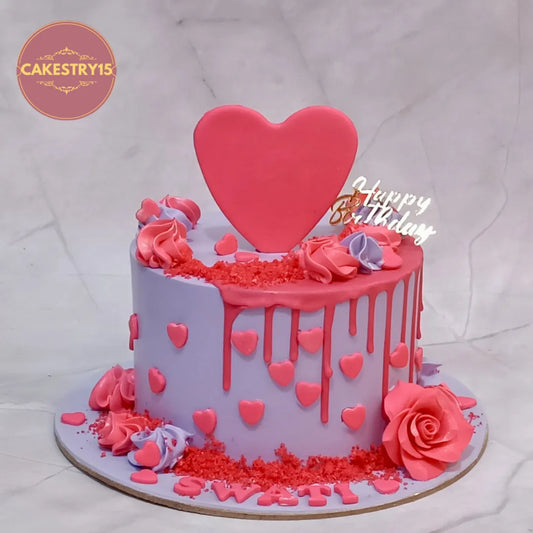 Elegant eggless cakes and birthday cake style theme cake Noida with pink hearts, lavender finish, and romantic birthday design.