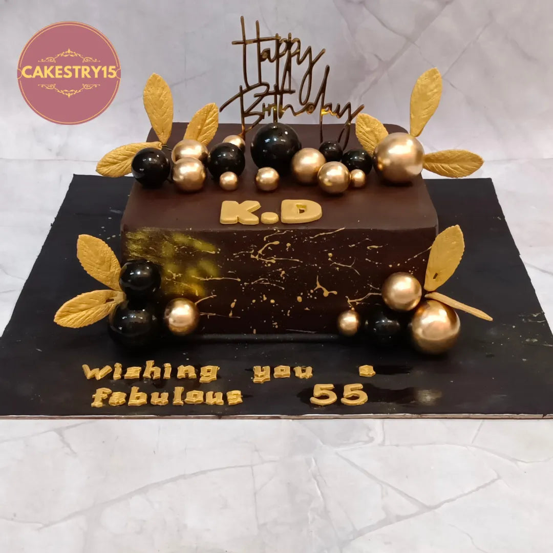 Premium Black and Gold Birthday Cake handcrafted as a kids birthday cake style theme cake Noida with fresh eggless cakes for elegant birthday celebrations.