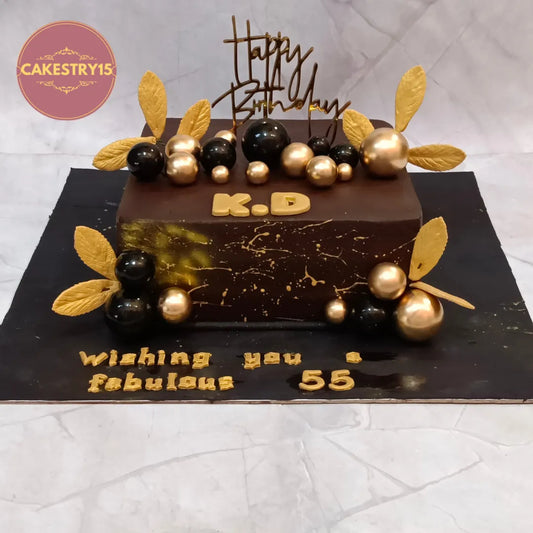 Premium Black and Gold Birthday Cake handcrafted as a kids birthday cake style theme cake Noida with fresh eggless cakes for elegant birthday celebrations.