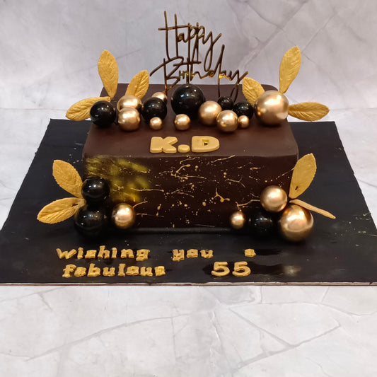 Premium Black and Gold Birthday Cake handcrafted as a kids birthday cake style theme cake Noida with fresh eggless cakes for elegant birthday celebrations.