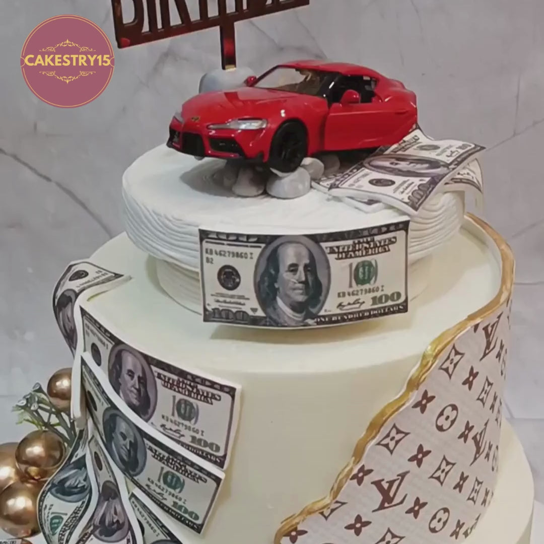 Boss Birthday Millionaire Theme Cake with rotating red sports car topper and luxury dollar design