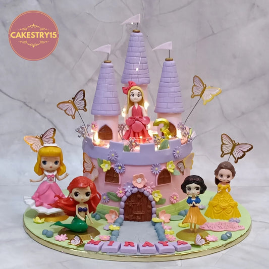 Princess and castle themed kids birthday cake with princess figures and butterflies, a premium theme cake Noida families choose from Cakestry15 eggless cakes collection.