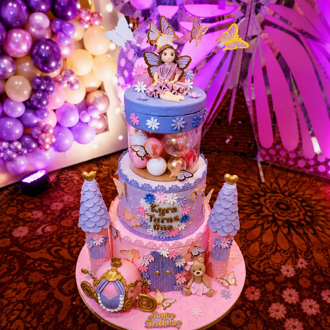 Princess doll kids birthday cake displayed at the celebration venue, a luxury theme cake Noida families choose, handcrafted eggless cakes for first birthday parties.