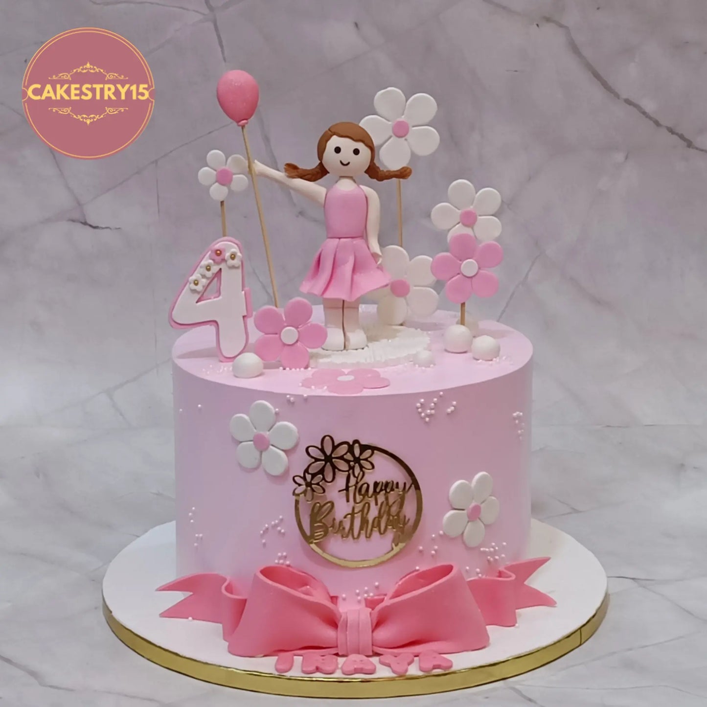 Princess doll theme kids birthday cake in Noida with fondant flowers and figurine, premium eggless cakes for girls