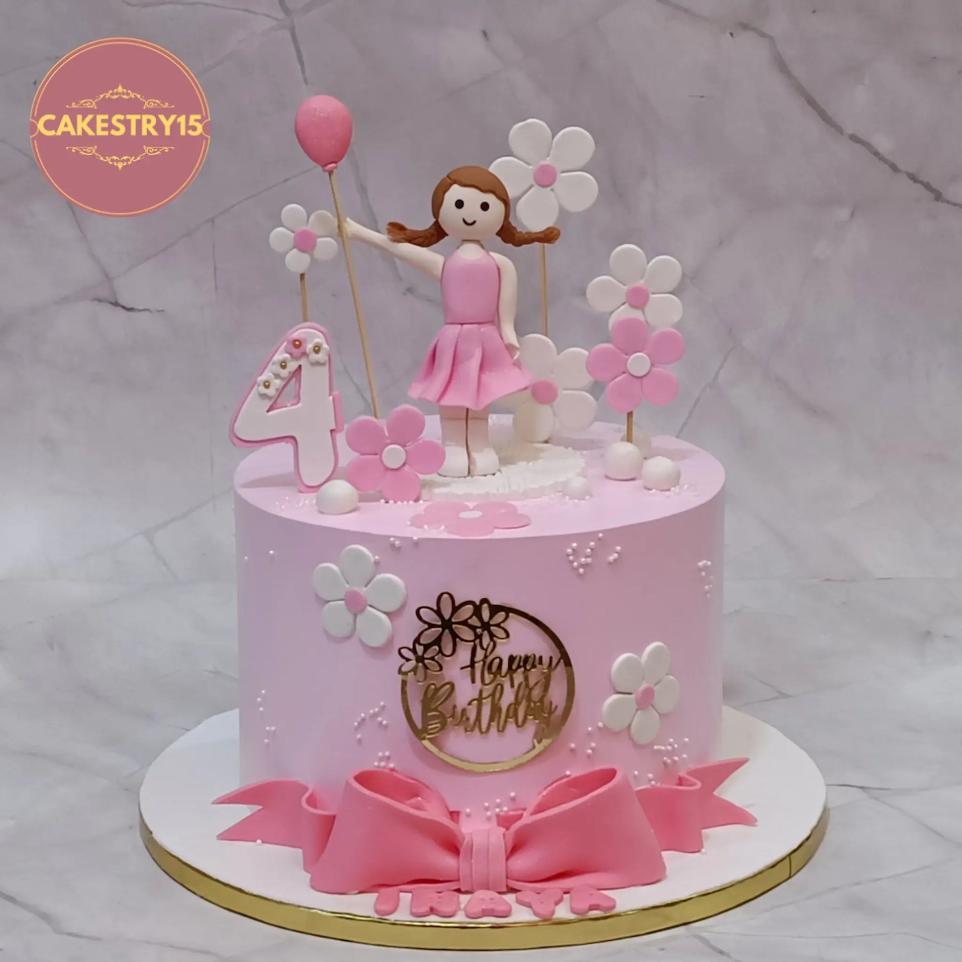 Princess doll theme kids birthday cake in Noida with fondant flowers and figurine, premium eggless cakes for girls