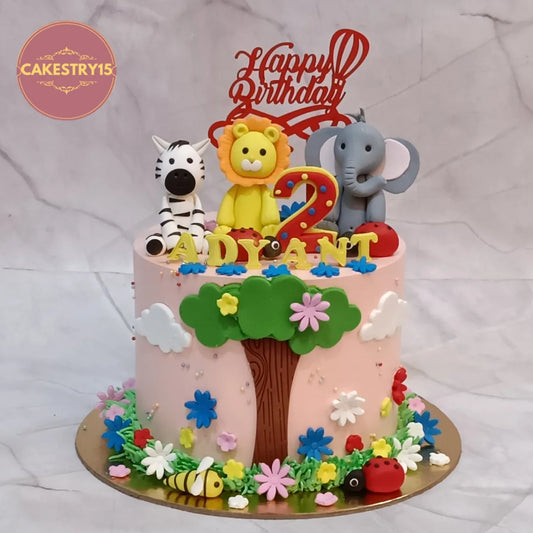 Safari Adventure kids birthday cake with jungle animals, premium eggless cakes and theme cake Noida design for boys.