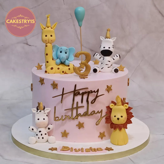 Safari Zoo Animals kids birthday cake with fondant zebra, elephant, giraffe and lion, handcrafted as a theme cake Noida using premium eggless cakes.