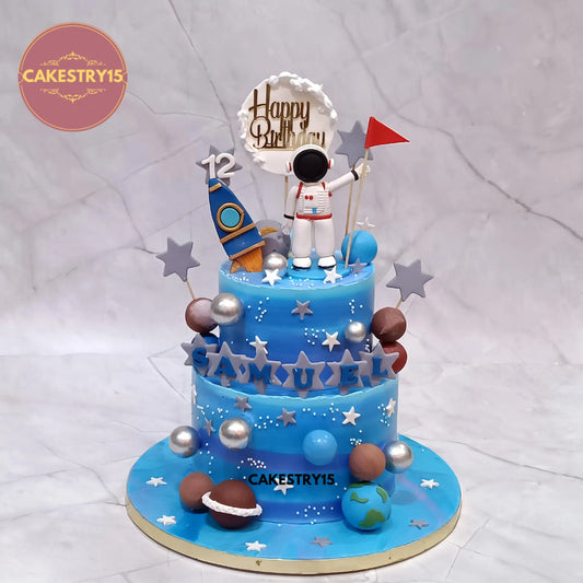 2-tier pineapple space theme cake with astronaut and planets by Cakestry15 Noida