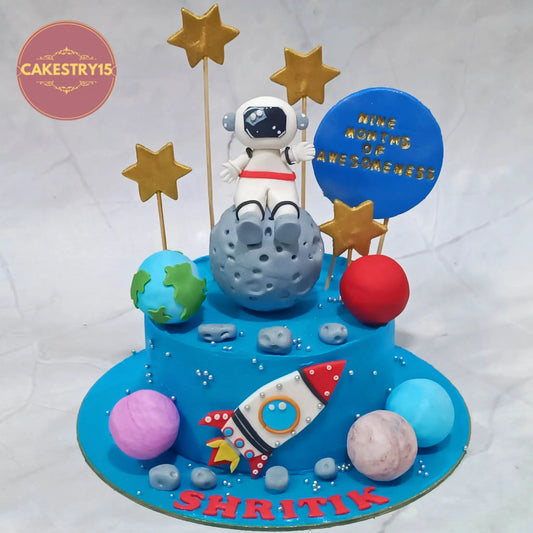 First birthday cake with space theme, eggless chocolate cake with astronaut and rocket design in Noida