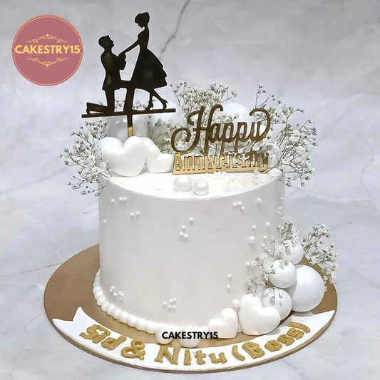 1kg blueberry anniversary cake with couple topper, happy anniversary topper, white faux balls, hearts and baby breath from Cakestry15
