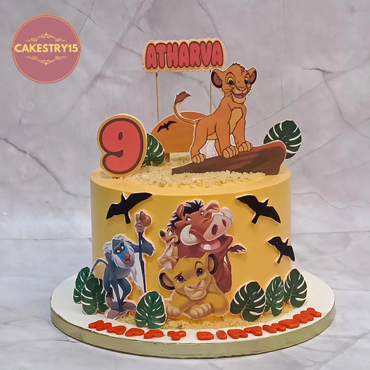 Premium Simba kids birthday cake featuring edible Simba images, jungle animals and green leaves, handcrafted as a theme cake Noida using fresh eggless cakes.