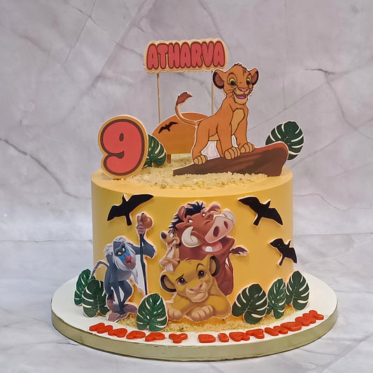 Premium Simba kids birthday cake featuring edible Simba images, jungle animals and green leaves, handcrafted as a theme cake Noida using fresh eggless cakes.