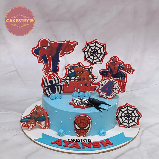Spiderman theme 1kg black forest cake with edible prints, cobwebs, and spiders from Cakestry15 in noida