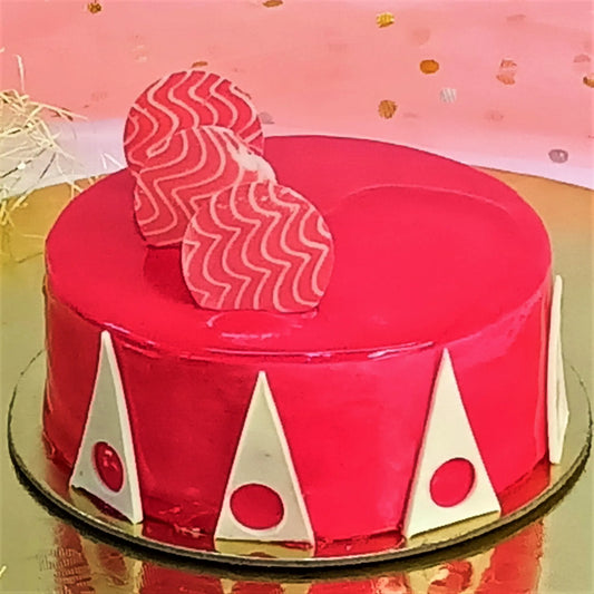 Strawberry cake layered with compote and chunks, topped with milk chocolate, from Cakestry15