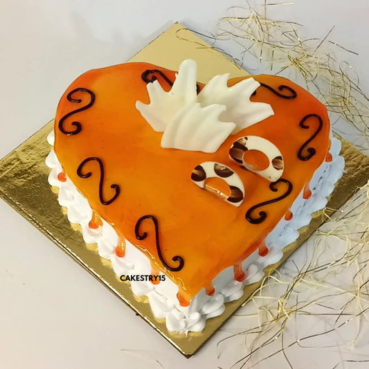 Heart-shaped butterscotch cake with nougat, whipped cream, and white chocolate topping from Cakestry15