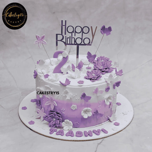 2-tier lavender and ivory butterfly birthday cake for 2-year-old girl named Taashvi by cakestry15,best bakery noida