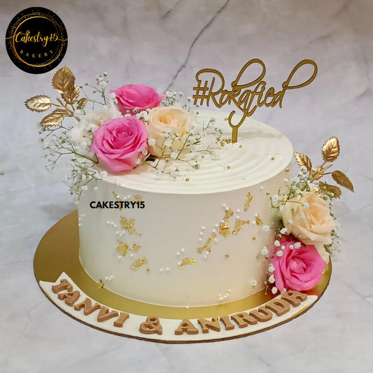 2kg blueberry eggless engagement cake with roses and rokafied topper from Cakestry15