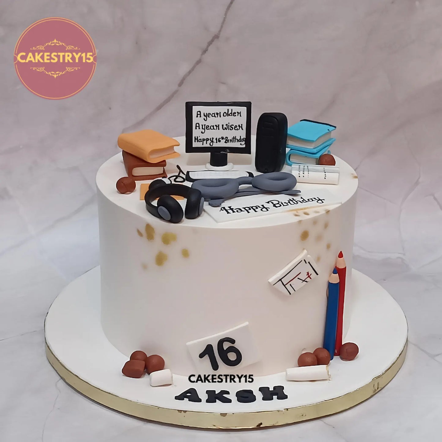Tech theme eggless truffle cake for 16th birthday with laptop and gadget fondant design made by Cakestry15 Noida