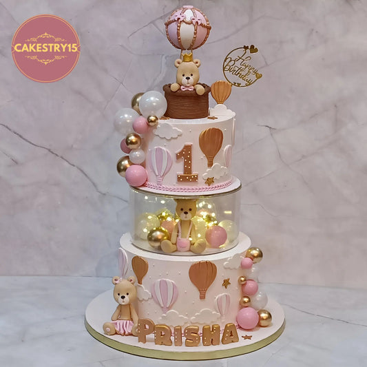 Eggless teddy air balloon first birthday cake with spacer lights for kids in Noida by Cakestry15
