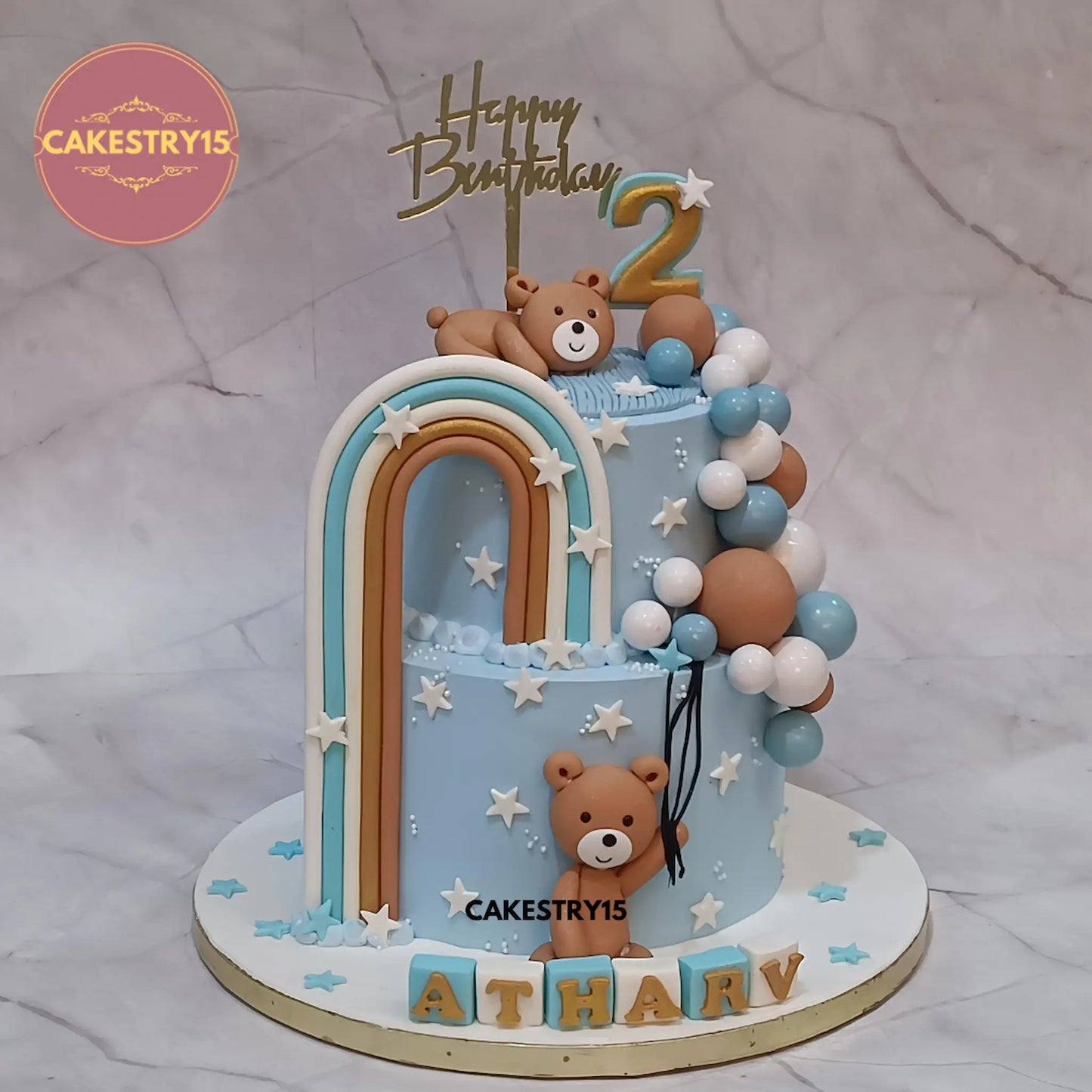 3kg chocolate teddy theme birthday cake with rainbow, balloons, and name blocks by Cakestry15 Noida.