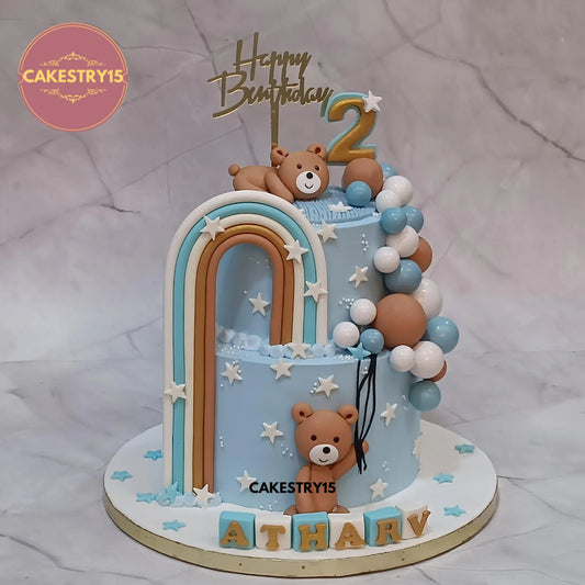3kg chocolate teddy theme birthday cake with rainbow, balloons, and name blocks by Cakestry15 Noida.